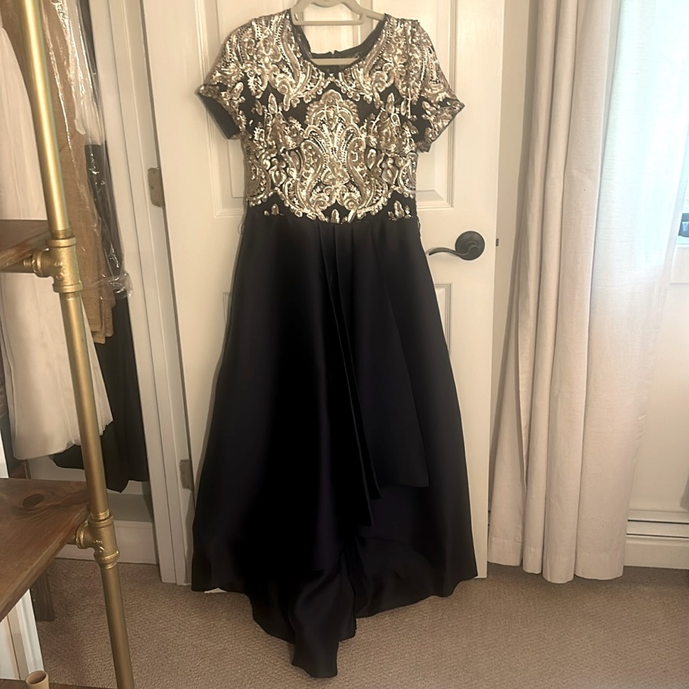 Beautiful navy blue and gold sequin gown.